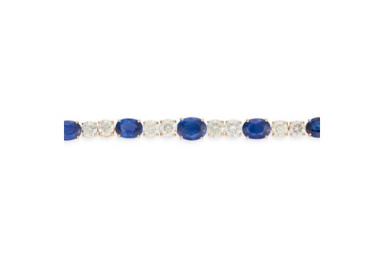 A SAPPHIRE AND DIAMOND BRACELET set with a graduating oval cut sapphires, accented by pairs of ro... - Image 2 of 2