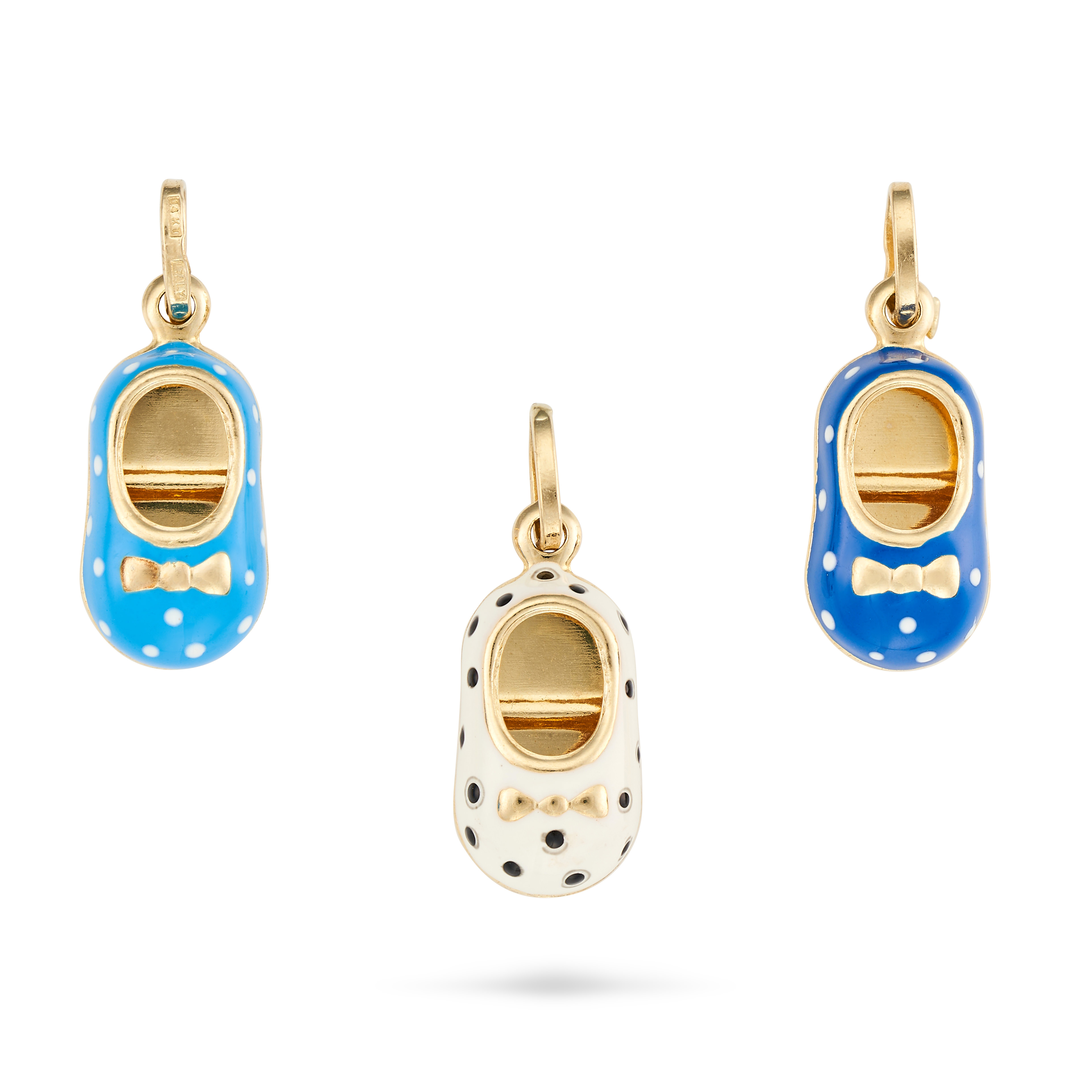 THREE ENAMEL SHOE CHARM / PENDANTS each designed as a shoe decorated with blue, white and black e...