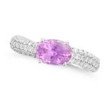 A PINK SAPPHIRE AND DIAMOND RING set with an oval cut pink sapphire of 1.84 carats, the shoulders...