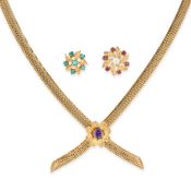 A GOLD NECKLACE in 9ct yellow gold, comprising rows of woven links in crossover design, with thre...