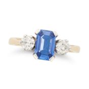 A SAPPHIRE AND DIAMOND THREE STONE RING set with an octagonal step cut sapphire of approximately ...