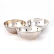 A SET OF THREE LATE VICTORIAN SILVER BOWLS