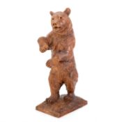A BLACK FOREST CARVED STANDING BEAR, CIRCA 1900