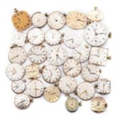 A COLLECTION OF LADY'S OMEGA WATCH MOVEMENTS AND DIALS