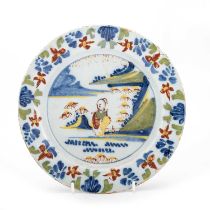 A LONDON DELFT POLYCHROME PLATE LAMBETH, CIRCA 1770