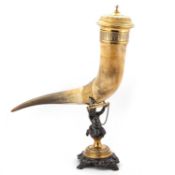 A VICTORIAN DRINKING HORN ON STAND