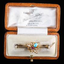 AN EARLY 20TH CENTURY YELLOW GOLD GEM-SET INSECT BROOCH