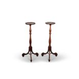 A PAIR OF 19TH CENTURY WALNUT TORCHÈRES