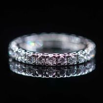 A PLATINUM AND DIAMOND ETERNITY RING