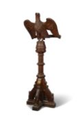 A LARGE 19TH CENTURY CARVED OAK EAGLE LECTERN