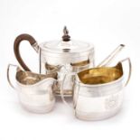 A GEORGE III/ IV SILVER MATCHED FOUR-PIECE TEA SERVICE