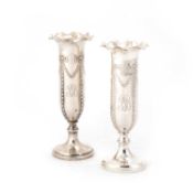 A PAIR OF LATE VICTORIAN SILVER VASES