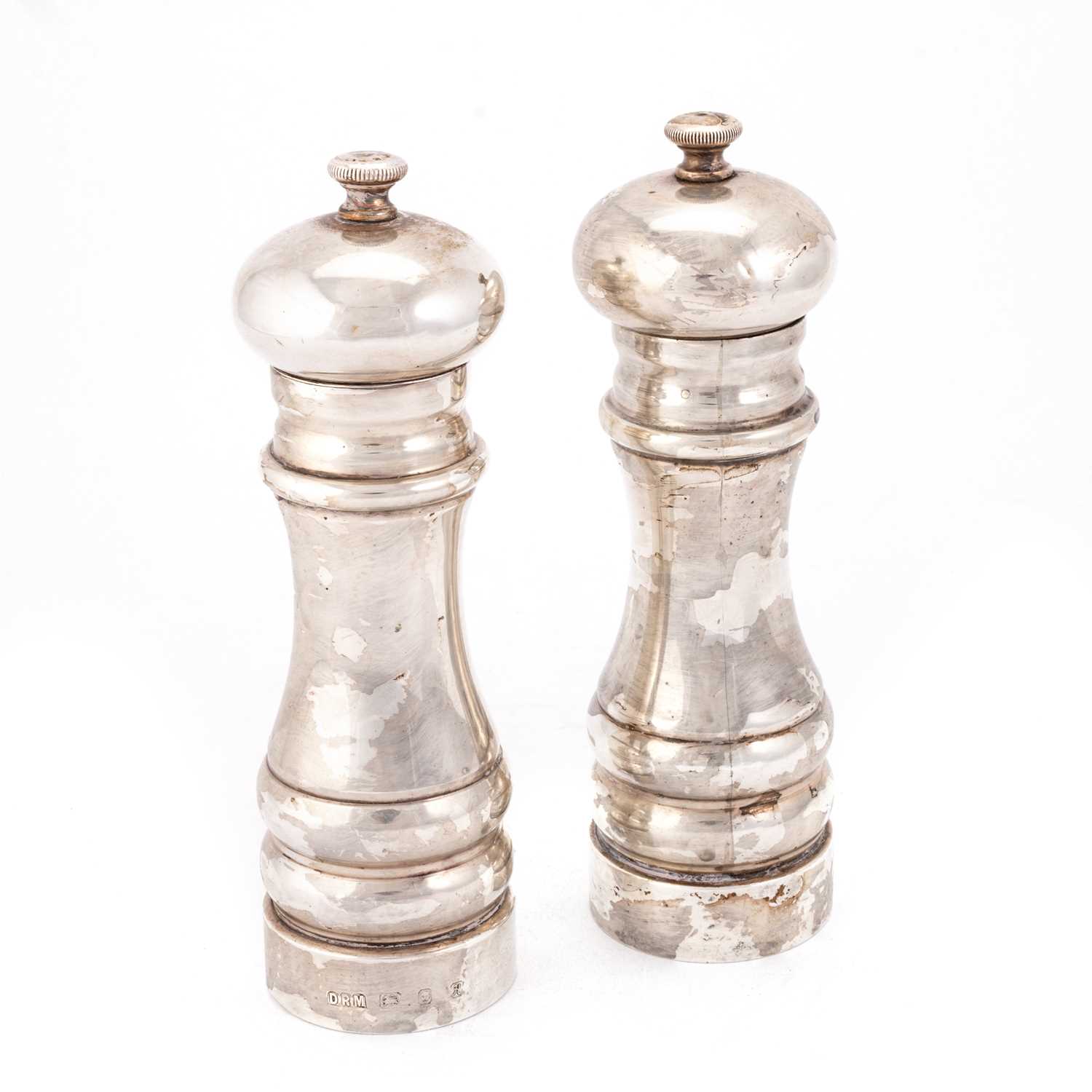 A PAIR OF ELIZABETH II SILVER PEPPER GRINDERS