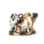 A MEISSEN GROUP OF A PUG AND TWO BOLOGNESE TERRIERS, AFTER THE MODEL BY J.J. KÄNDLER, CIRCA 1860