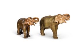 A LARGE ROYAL DUX MODEL OF AN ELEPHANT, TOGETHER WITH ANOTHER LARGE ELEPHANT MODEL