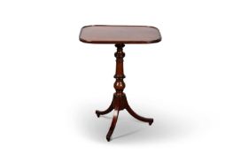 A REGENCY MAHOGANY TRIPOD TABLE WITH AN ADJUSTABLE TOP