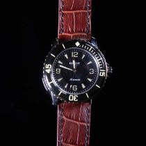 A GENTS STEEL COURGEUT AUTOMATIC STRAP WATCH