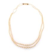 A NATURAL SALTWATER DOUBLE STRAND GRADUATED PEARL NECKLACE