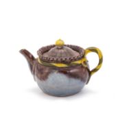A JAPANESE GLAZED EARTHENWARE TEAPOT, PROBABLY 19TH CENTURY