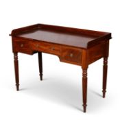 A MID-19TH CENTURY MAHOGANY WRITING TABLE, IN THE MANNER OF GILLOWS