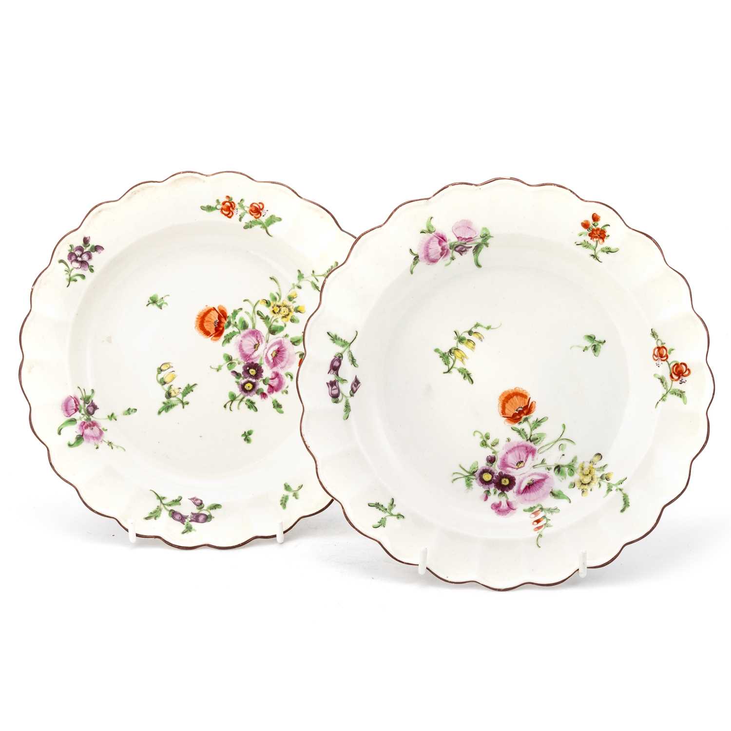 A PAIR OF WORCESTER POLYCHROME DISHES, CIRCA 1770