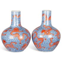 A LARGE PAIR OF CHINESE UNDERGLAZE BLUE AND IRON-RED DRAGON VASES, TIANQIUPING
