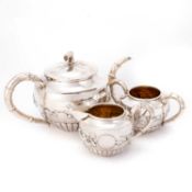 AN EARLY 20TH CENTURY CHINESE SILVER THREE-PIECE TEA SERVICE