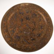 A LARGE INDIAN SILVER AND COPPER OVERLAID BRASS CHARGER