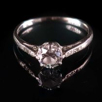 AN ART DECO PLATINUM DIAMOND SOLITAIRE RING