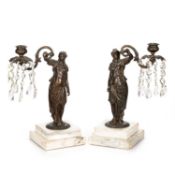 A PAIR OF 19TH CENTURY BRONZE FIGURAL CANDLESTICKS