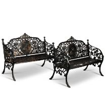 A PAIR OF CAST IRON GARDEN BENCHES, IN COALBROOKDALE STYLE