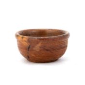 A 19TH CENTURY TURNED TREEN BOWL