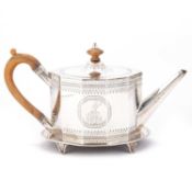 A GEORGE III SILVER TEAPOT ON STAND