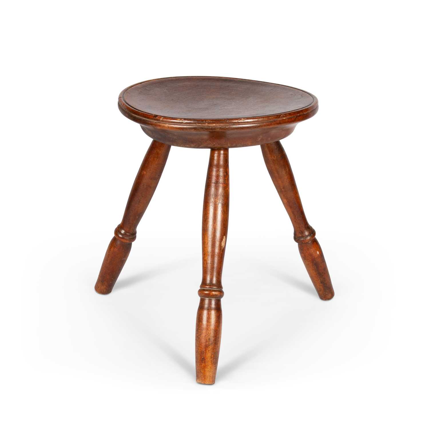 A 19TH CENTURY SYCAMORE CHEESE STOOL