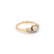AN 18 CARAT YELLOW GOLD NATURAL SALTWATER PEARL AND DIAMOND THREE STONE RING