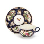 A WORCESTER FACTORY-DECORATED BLUE SCALE CUP AND SAUCER, CIRCA 1770