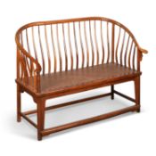 A CHINESE HARDWOOD COMB-BACK SETTEE, LATE QING DYNASTY OR EARLY REPUBLICAN