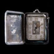 A CONTINENTAL SILVER EBEL PURSE WATCH WITH CHAIN