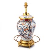 A GILT-METAL MOUNTED IMARI TABLE LAMP, 19TH CENTURY