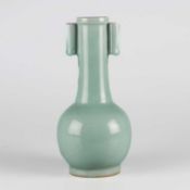 A LARGE CHINESE CELADON ARROWHEAD BOTTLE VASE