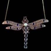 A 18 CARAT DIAMOND, SAPPHIRE, RUBY, AND OPAL SET DRAGONFLY NECKLACE
