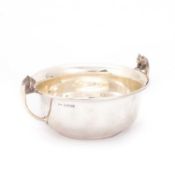 A GEORGE V SILVER NOVELTY TWIN-HANDLED BOWL