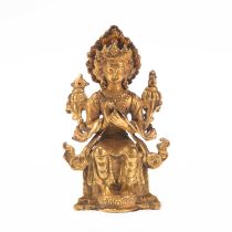 A TIBETAN GILT-BRONZE FIGURE OF MAITREYA