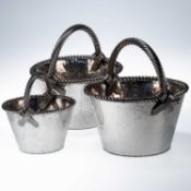 A SET OF THREE VALENTI SILVER-PLATED BASKETS