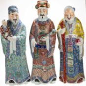 A LARGE TRIO OF CHINESE FAMILLE ROSE PORCELAIN FIGURES OF IMMORTALS, GUANGXU PERIOD