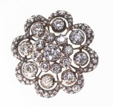 AN IMPRESSIVE ANTIQUE DIAMOND FLOWER BROOCH