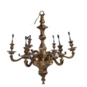 A LARGE BAROQUE STYLE BRASS SIX-LIGHT CHANDELIER