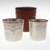 TWO FRENCH CASED SILVER BEAKERS