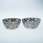 A PAIR OF EARLY 20TH CENTURY CHINESE SILVER BOWLS