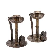 A PAIR OF ARTS AND CRAFTS GOBERG CANDLESTICKS